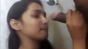 A stunning woman performs a passionate oral and manual stimulation for the camera