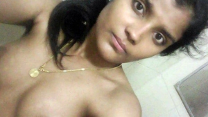 A young woman uses her phone for self-stimulation