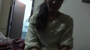 A young woman experiences intense sexual activity in this heated video