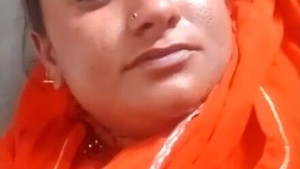 A village woman reveals her intimate parts for her spouse in a video