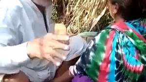 Elderly man Tau engages in sexual activity with Randi amidst the wilderness