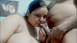 Indian aunty's large breasts receive intense penetration and oral stimulation