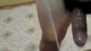 Desi Indian auntie gets anal fucked and pees on camera