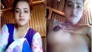 Desi hottie flaunts her breasts in a sizzling solo performance