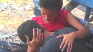 Indian girlfriend fondles breasts in open-air setting