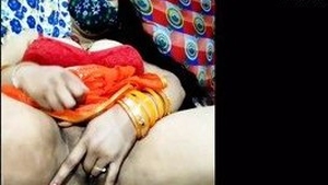 Indian housewives' webcam performance featuring lubricated vaginas and oil massage