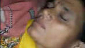 A mature woman from the village enjoys sexual intercourse with a man