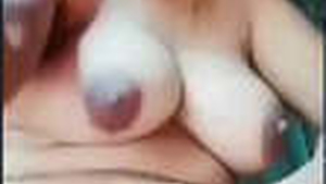 Aroused rural Indian woman displays and pleasures herself with her digits