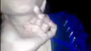 A married woman reveals her breasts to her romantic partner