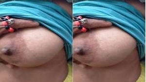 Busty Telugu bhabhi squeezes her breasts in steamy video
