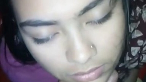 A charming South Asian girl enjoys giving oral pleasure to her boyfriend