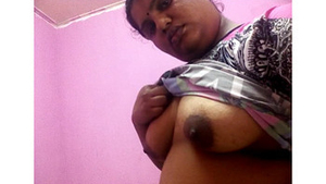 Mature Indian woman flaunts her breasts in front of her husband
