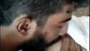 A man gives oral pleasure to a busty woman