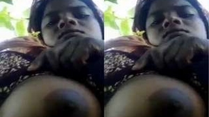 Watch a rural Indian woman flaunt her breasts in a steamy video