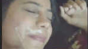 A stunning woman overcomes shyness and delivers an incredible oral performance on a large penis