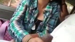 A youthful girl pleasures her uncle with a passionate oral sex and indulges in self-pleasure inside his vehicle