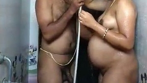 A pregnant woman has sex with an elderly man in a low-quality video