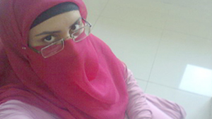 Adorable girl indulges in nude selfies