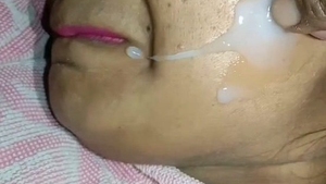 After intense session, semen on her visage