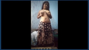 Desi teen with a big booty displays and self-pleasures