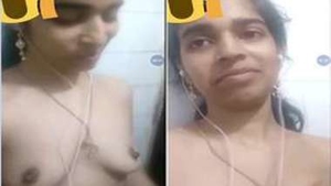 Busty Indian babe masturbates with her hands