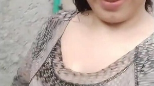 A Pakistani girl with large breasts becomes playful