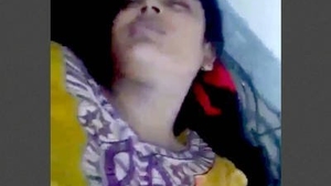 A young and attractive Desi girl engages in sexual activity