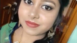 Sensual Mou, a Bengali beauty with big breasts, in a tantalizing video