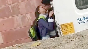 College-aged Indian teens indulge in passionate kissing
