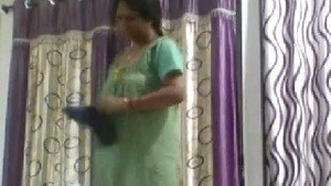 Desi aunty's private moment caught on MMS video