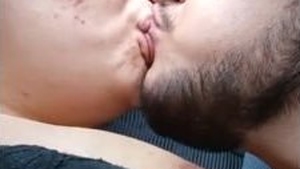 Indian lovers share a passionate kiss in a steamy video