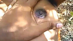 Telugu girl masturbates and fucks in the outdoors