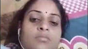 Horny Bhabhi presses her boobs on video call and gets off