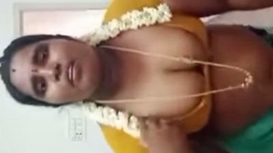 Indian aunty with huge boobs gets naughty