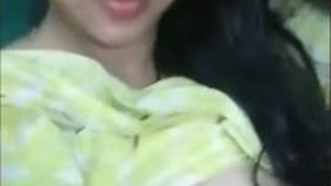 Young and cute girl shows off her big boobs and gets fingered