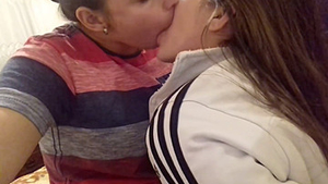 Horny lesbians indulge in deep kissing and oral stimulation