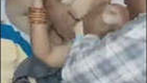 Elderly woman with large breasts receives oral and vaginal penetration from younger man