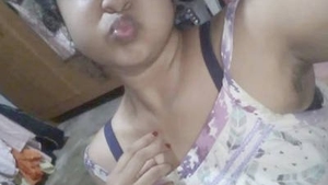 Watch a cute Indian girl flaunt her small boobs on cam