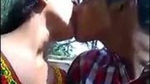Outdoor sex scene with boob press and foreplay in Indian college couple video