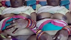 Horny aunty gets off with veggies in solo video