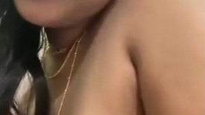 Anamika's large breasts bounce while she rides in a sex video featuring college students