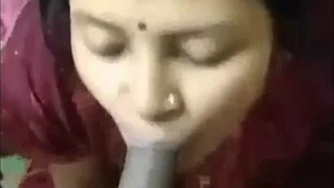 A mature wife with large breasts gives a sensual oral sex