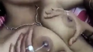 Married Bengali girl enjoys boob pressure and milking