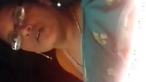 Mallu aunty showing Boobs in auto