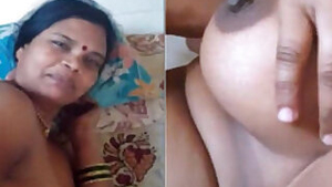 Shy Indian MILF takes in XXX video before sex with hubby