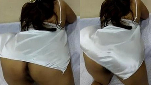 Indian aunt flaunts her ample rear end