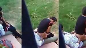 Indian desi girl with sex lover in the park being filmed by a voyeur
