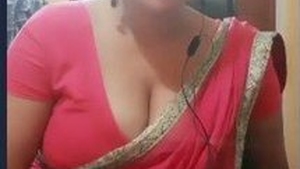 Desi aunty in red saree with amazing figure gets naughty