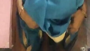 Amateur hd porn music video where Desi MILF lifts blue dress to play with pussy