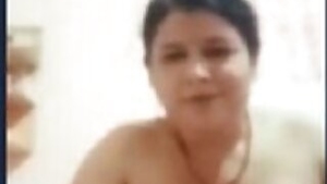 Desi aunty fingering her tight pussy video call with lover